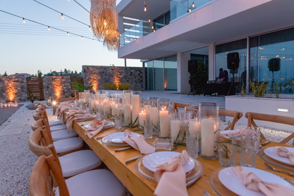 Close up of banquet table alrrady set up for a private dinner function at one of Ezoria's villas in Cyprus